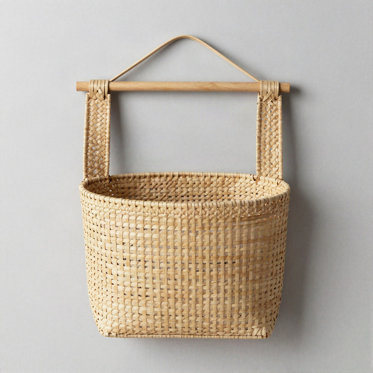 Woven wall hanging basket display